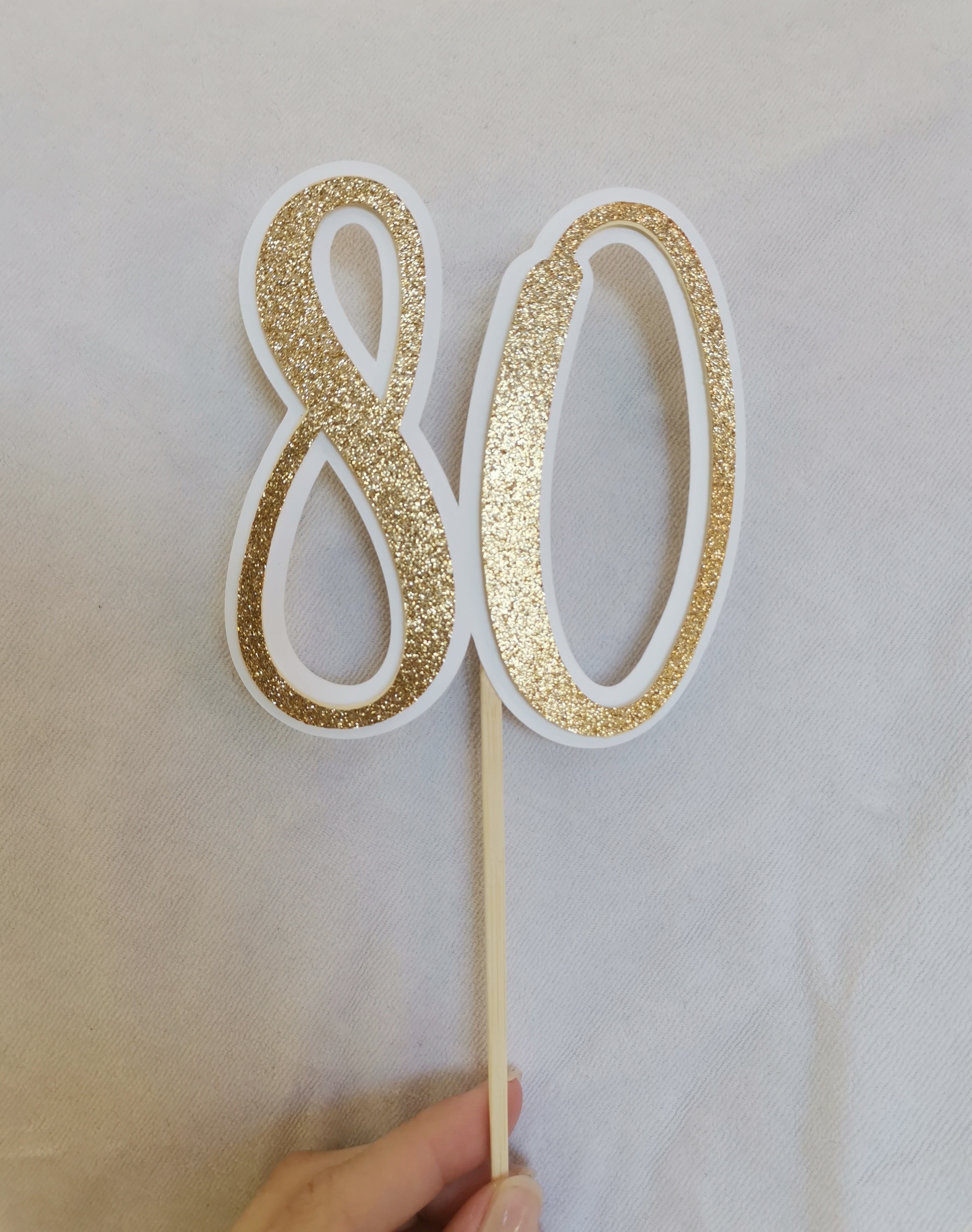 Toper za tortico, število